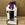 Candelabro blanco con flores en tonos lilas - Imagen 2