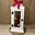 Candelabro blanco con flores en tonos rojos - Imagen 1