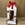 Candelabro blanco con flores en tonos rojos - Imagen 2