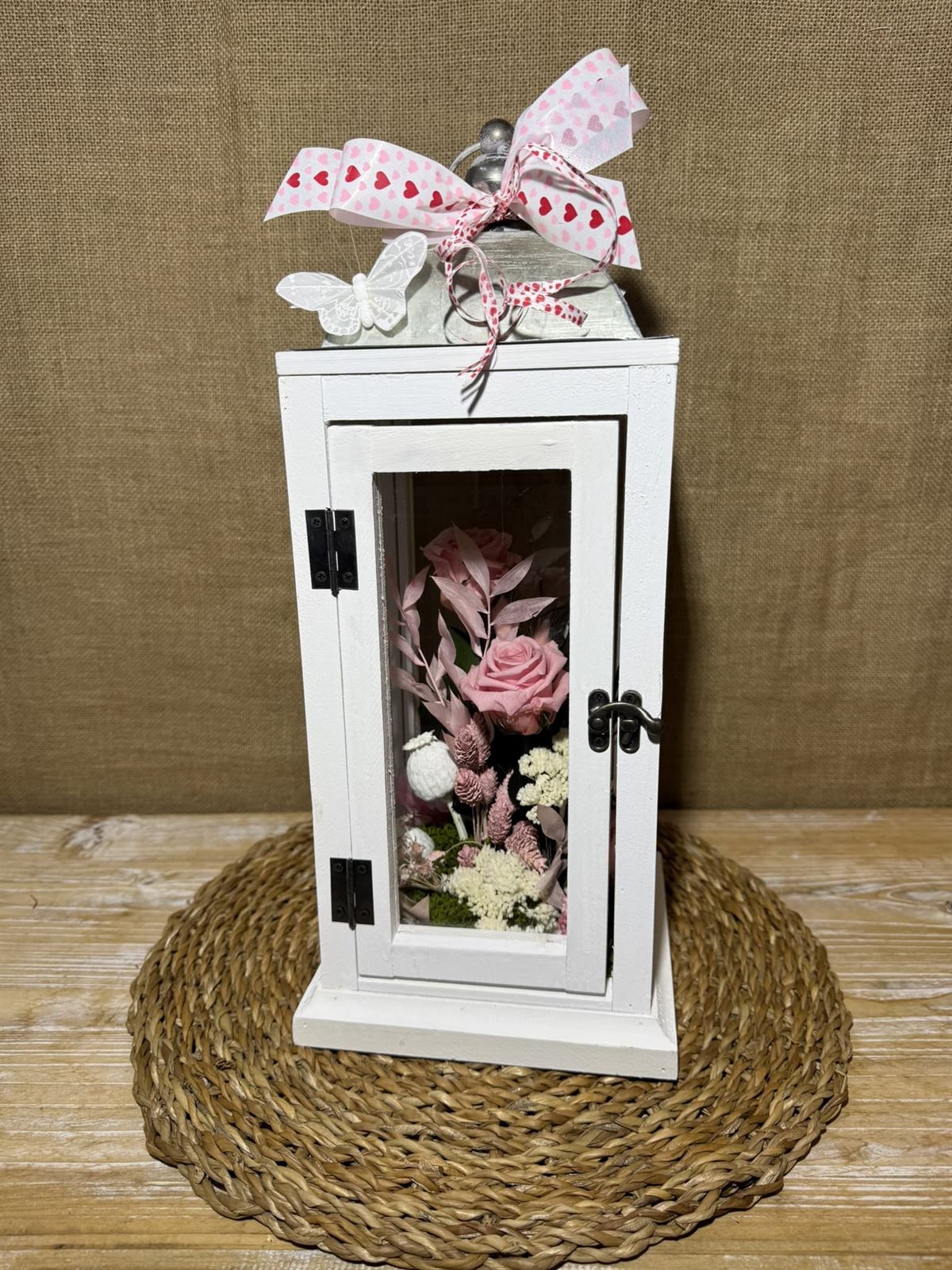 Candelabro blanco en tonos rosas - Imagen 1