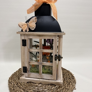 Candelabro marrón en tonos naranjas - Imagen 1