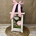Candelabro pequeño blanco con flores en tonos rosas - Imagen 1